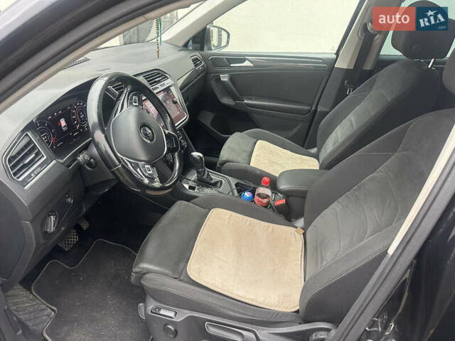 Черный Фольксваген Тигуан, объемом двигателя 1.97 л и пробегом 235 тыс. км за 21000 $, фото 5 на Automoto.ua