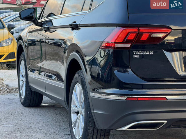 Черный Фольксваген Тигуан, объемом двигателя 1.98 л и пробегом 81 тыс. км за 21500 $, фото 81 на Automoto.ua