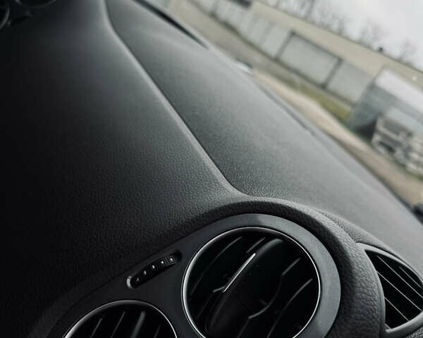 Чорний Фольксваген Тігуан, об'ємом двигуна 1.98 л та пробігом 210 тис. км за 11400 $, фото 8 на Automoto.ua