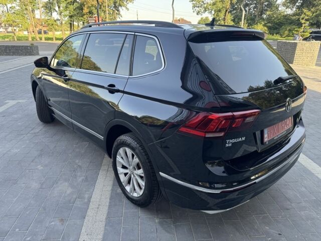 Черный Фольксваген Тигуан, объемом двигателя 2 л и пробегом 173 тыс. км за 16400 $, фото 6 на Automoto.ua