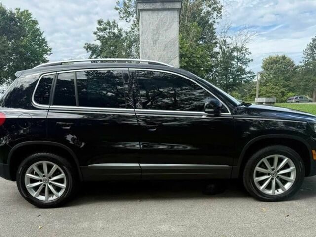 Чорний Фольксваген Тігуан, об'ємом двигуна 2 л та пробігом 52 тис. км за 3200 $, фото 5 на Automoto.ua