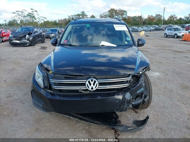 Черный Фольксваген Тигуан, объемом двигателя 2 л и пробегом 157 тыс. км за 8600 $, фото 1 на Automoto.ua