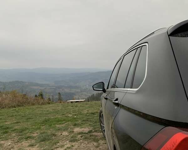 Чорний Фольксваген Тігуан, об'ємом двигуна 1.97 л та пробігом 245 тис. км за 25500 $, фото 1 на Automoto.ua