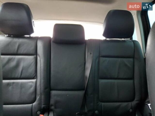 Черный Фольксваген Тигуан, объемом двигателя 1.98 л и пробегом 65 тыс. км за 650 $, фото 9 на Automoto.ua