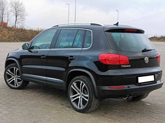 Чорний Фольксваген Тігуан, об'ємом двигуна 2 л та пробігом 82 тис. км за 10300 $, фото 3 на Automoto.ua