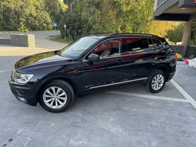 Черный Фольксваген Тигуан, объемом двигателя 2 л и пробегом 173 тыс. км за 16400 $, фото 3 на Automoto.ua