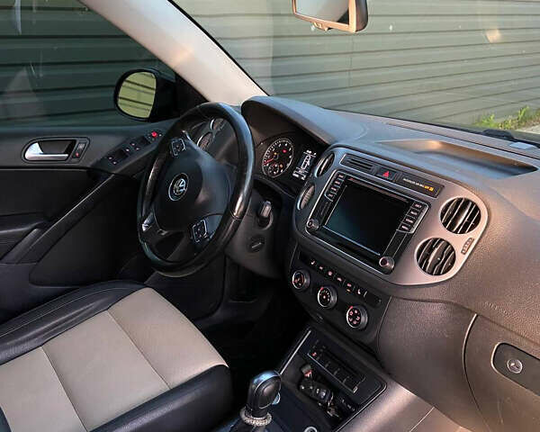 Чорний Фольксваген Тігуан, об'ємом двигуна 1.98 л та пробігом 145 тис. км за 13400 $, фото 3 на Automoto.ua