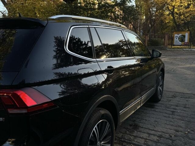 Чорний Фольксваген Тігуан, об'ємом двигуна 2 л та пробігом 127 тис. км за 22000 $, фото 2 на Automoto.ua