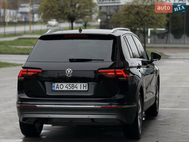 Черный Фольксваген Тигуан, объемом двигателя 2 л и пробегом 209 тыс. км за 23800 $, фото 8 на Automoto.ua