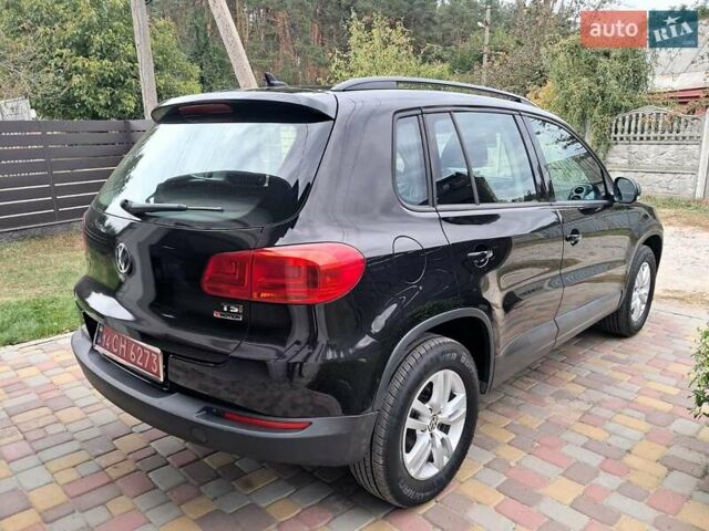 Чорний Фольксваген Тігуан, об'ємом двигуна 1.98 л та пробігом 143 тис. км за 12999 $, фото 4 на Automoto.ua