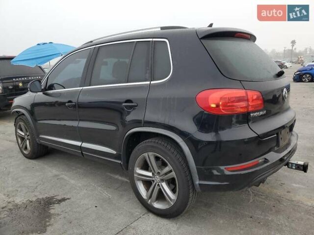 Черный Фольксваген Тигуан, объемом двигателя 1.98 л и пробегом 65 тыс. км за 650 $, фото 1 на Automoto.ua