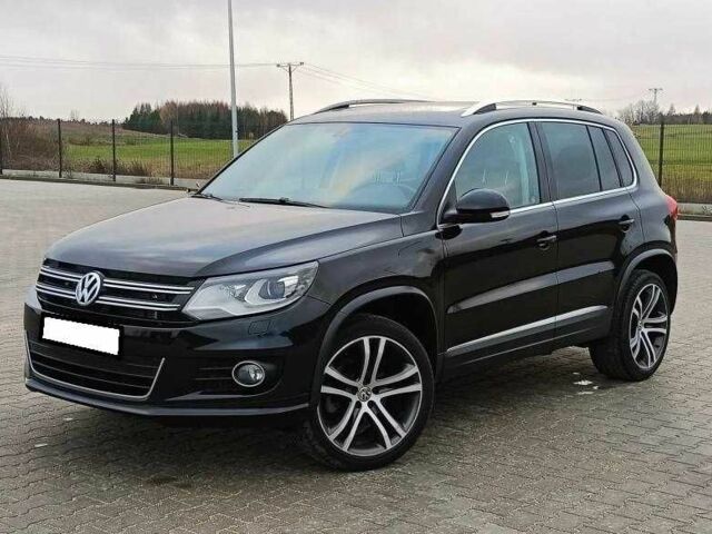 Чорний Фольксваген Тігуан, об'ємом двигуна 2 л та пробігом 82 тис. км за 10300 $, фото 1 на Automoto.ua