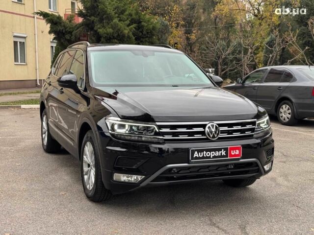 Черный Фольксваген Тигуан, объемом двигателя 2 л и пробегом 143 тыс. км за 18690 $, фото 6 на Automoto.ua