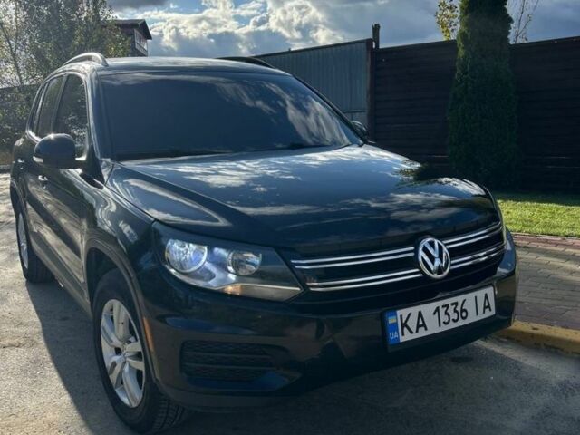 Черный Фольксваген Тигуан, объемом двигателя 2 л и пробегом 145 тыс. км за 12500 $, фото 1 на Automoto.ua