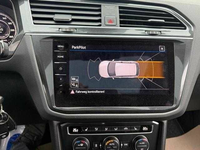 Черный Фольксваген Тигуан, объемом двигателя 2 л и пробегом 102 тыс. км за 12100 $, фото 7 на Automoto.ua