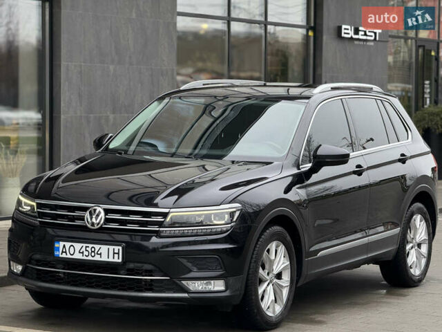 Черный Фольксваген Тигуан, объемом двигателя 2 л и пробегом 209 тыс. км за 23800 $, фото 4 на Automoto.ua