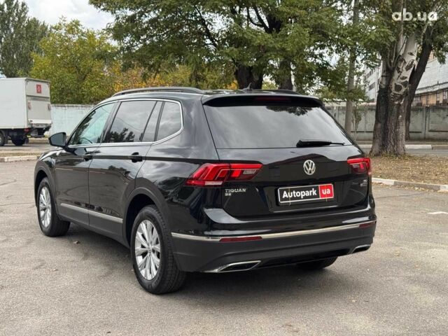Черный Фольксваген Тигуан, объемом двигателя 2 л и пробегом 143 тыс. км за 18690 $, фото 2 на Automoto.ua