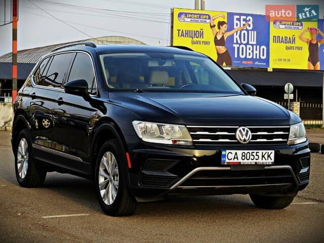 Черный Фольксваген Тигуан, объемом двигателя 1.98 л и пробегом 155 тыс. км за 18800 $, фото 1 на Automoto.ua