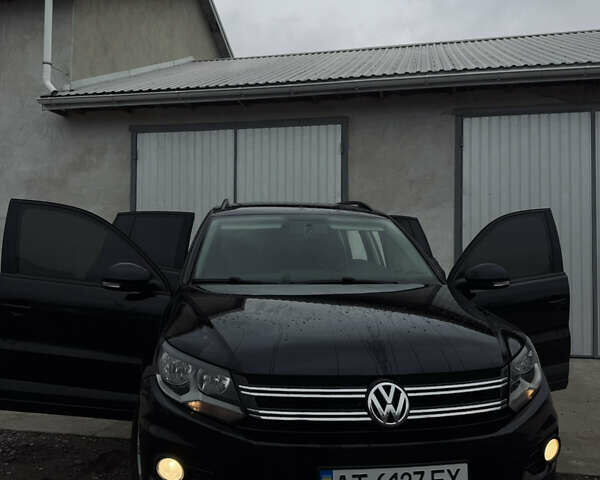 Чорний Фольксваген Тігуан, об'ємом двигуна 1.98 л та пробігом 210 тис. км за 11400 $, фото 1 на Automoto.ua