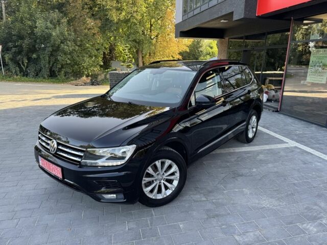 Черный Фольксваген Тигуан, объемом двигателя 2 л и пробегом 173 тыс. км за 16400 $, фото 2 на Automoto.ua