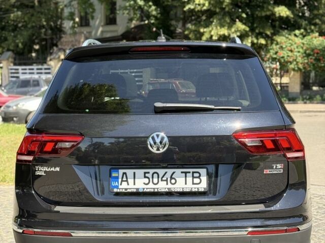 Черный Фольксваген Тигуан, объемом двигателя 2 л и пробегом 145 тыс. км за 19700 $, фото 3 на Automoto.ua