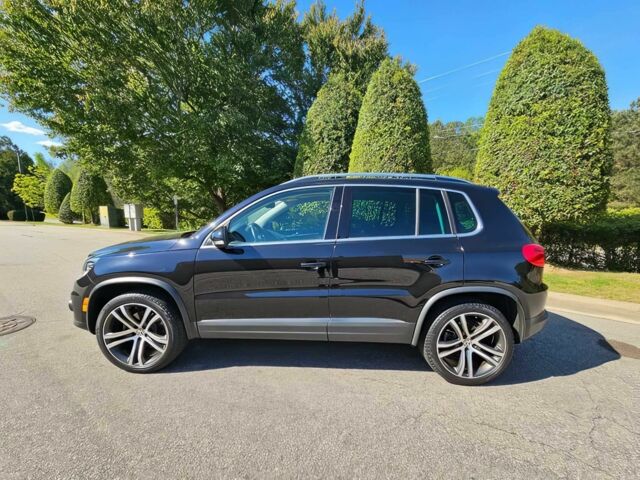 Черный Фольксваген Тигуан, объемом двигателя 2 л и пробегом 57 тыс. км за 11300 $, фото 1 на Automoto.ua