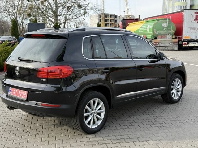 Чорний Фольксваген Тігуан, об'ємом двигуна 2 л та пробігом 104 тис. км за 14800 $, фото 4 на Automoto.ua