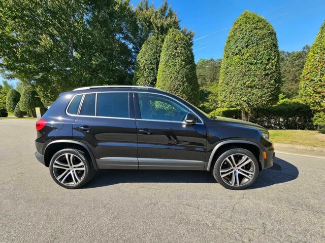 Черный Фольксваген Тигуан, объемом двигателя 2 л и пробегом 57 тыс. км за 9000 $, фото 6 на Automoto.ua