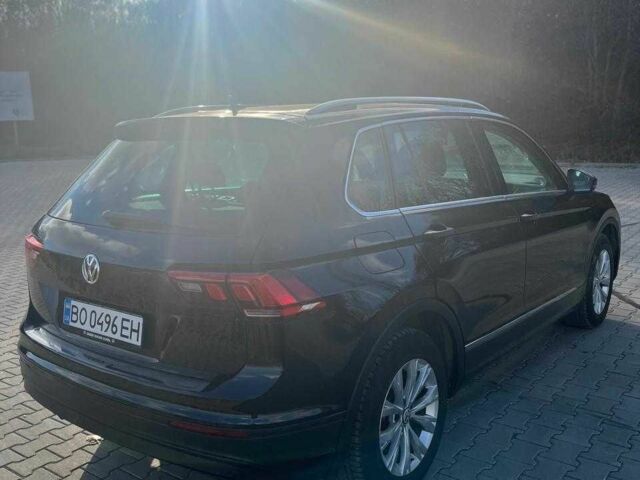 Черный Фольксваген Тигуан, объемом двигателя 2 л и пробегом 300 тыс. км за 17000 $, фото 4 на Automoto.ua