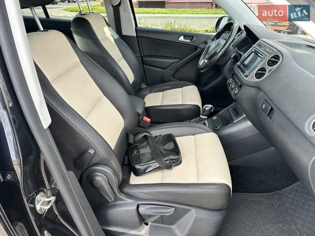 Черный Фольксваген Тигуан, объемом двигателя 2 л и пробегом 175 тыс. км за 12333 $, фото 64 на Automoto.ua