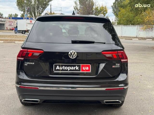 Черный Фольксваген Тигуан, объемом двигателя 2 л и пробегом 143 тыс. км за 18690 $, фото 3 на Automoto.ua