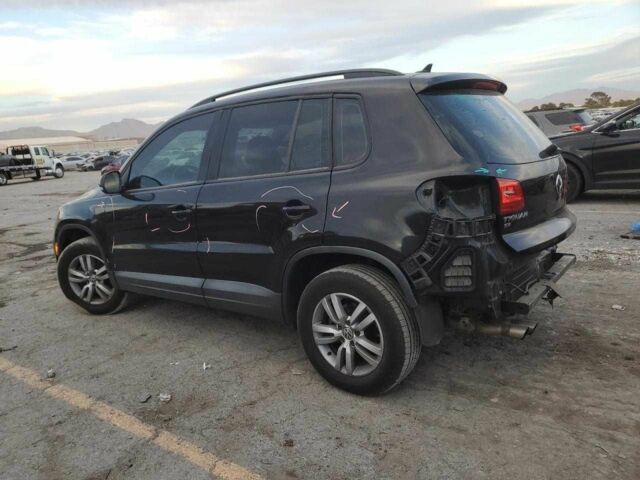 Черный Фольксваген Тигуан, объемом двигателя 2 л и пробегом 142 тыс. км за 2500 $, фото 1 на Automoto.ua