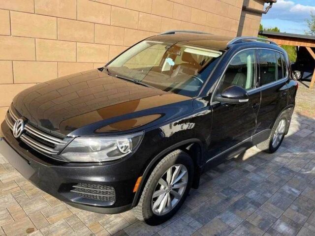 Чорний Фольксваген Тігуан, об'ємом двигуна 2 л та пробігом 153 тис. км за 12000 $, фото 2 на Automoto.ua