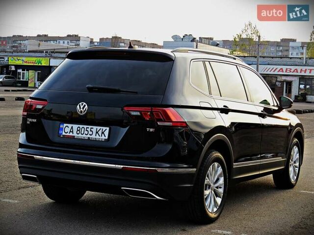 Черный Фольксваген Тигуан, объемом двигателя 1.98 л и пробегом 155 тыс. км за 18800 $, фото 2 на Automoto.ua