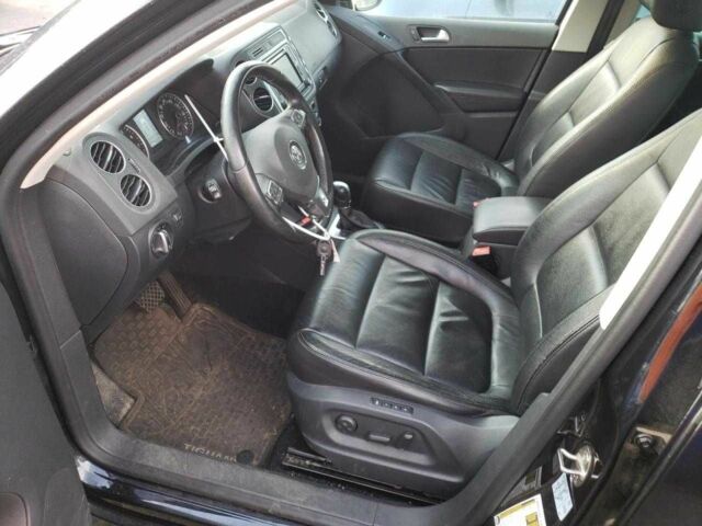 Черный Фольксваген Тигуан, объемом двигателя 2 л и пробегом 118 тыс. км за 2500 $, фото 6 на Automoto.ua