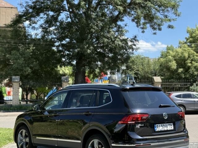 Черный Фольксваген Тигуан, объемом двигателя 2 л и пробегом 145 тыс. км за 19700 $, фото 1 на Automoto.ua