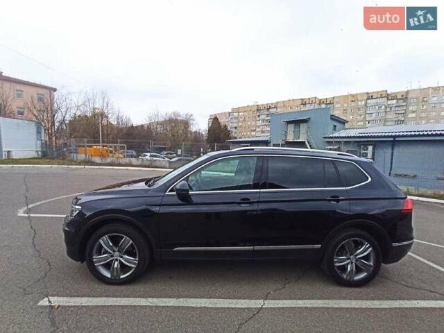 Черный Фольксваген Тигуан, объемом двигателя 2 л и пробегом 107 тыс. км за 21800 $, фото 1 на Automoto.ua