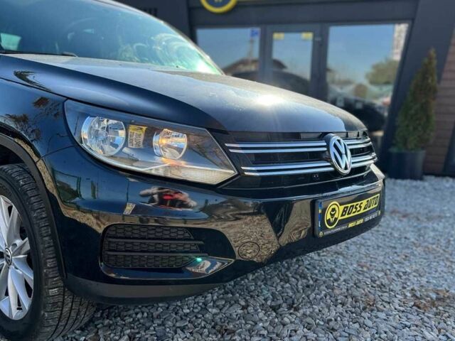 Чорний Фольксваген Тігуан, об'ємом двигуна 2 л та пробігом 142 тис. км за 12200 $, фото 1 на Automoto.ua