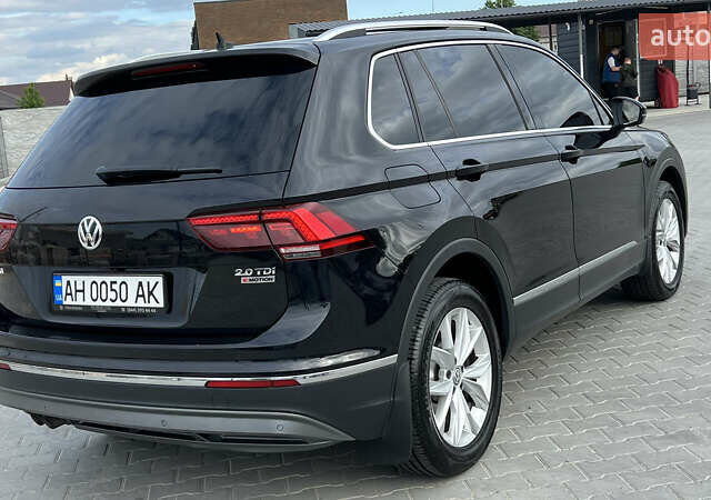 Черный Фольксваген Тигуан, объемом двигателя 1.97 л и пробегом 250 тыс. км за 23500 $, фото 17 на Automoto.ua