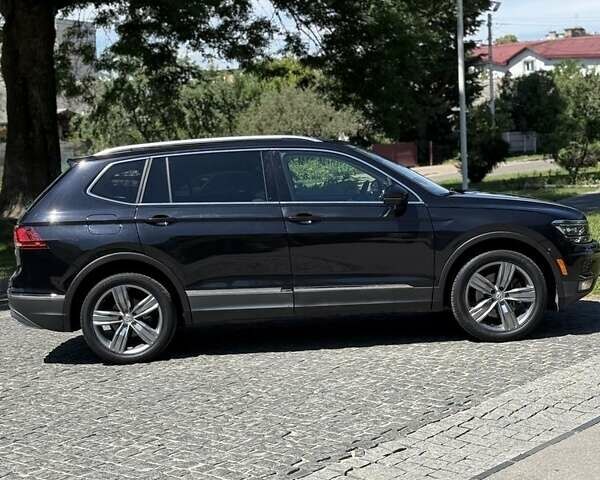 Черный Фольксваген Тигуан, объемом двигателя 2 л и пробегом 145 тыс. км за 19700 $, фото 5 на Automoto.ua