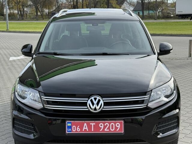 Чорний Фольксваген Тігуан, об'ємом двигуна 2 л та пробігом 104 тис. км за 14800 $, фото 1 на Automoto.ua