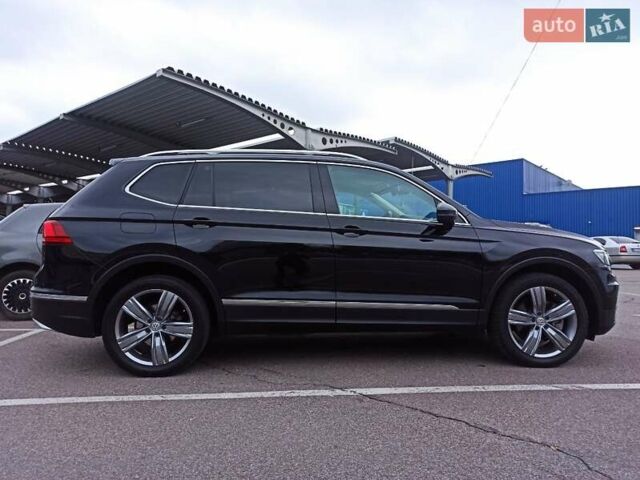 Черный Фольксваген Тигуан, объемом двигателя 2 л и пробегом 107 тыс. км за 21800 $, фото 2 на Automoto.ua