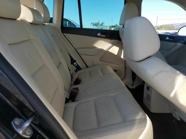 Черный Фольксваген Тигуан, объемом двигателя 2 л и пробегом 80 тыс. км за 2000 $, фото 10 на Automoto.ua