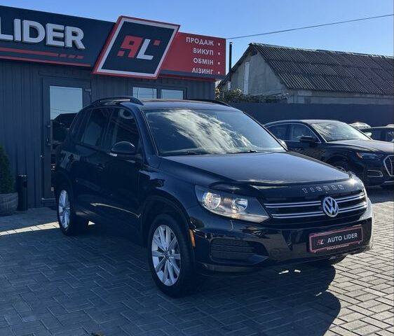 Черный Фольксваген Тигуан, объемом двигателя 2 л и пробегом 183 тыс. км за 14000 $, фото 1 на Automoto.ua