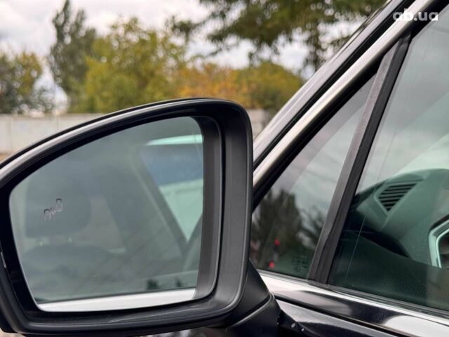 Черный Фольксваген Тигуан, объемом двигателя 2 л и пробегом 143 тыс. км за 18690 $, фото 12 на Automoto.ua