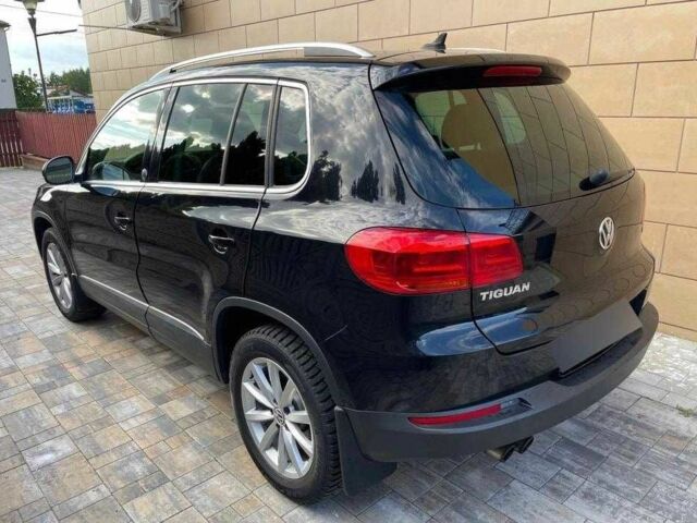Чорний Фольксваген Тігуан, об'ємом двигуна 2 л та пробігом 153 тис. км за 12000 $, фото 3 на Automoto.ua