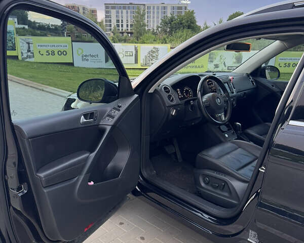 Чорний Фольксваген Тігуан, об'ємом двигуна 2 л та пробігом 117 тис. км за 15800 $, фото 15 на Automoto.ua