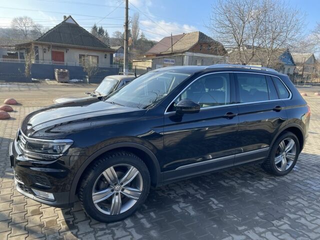 Черный Фольксваген Тигуан, объемом двигателя 2 л и пробегом 225 тыс. км за 24000 $, фото 5 на Automoto.ua