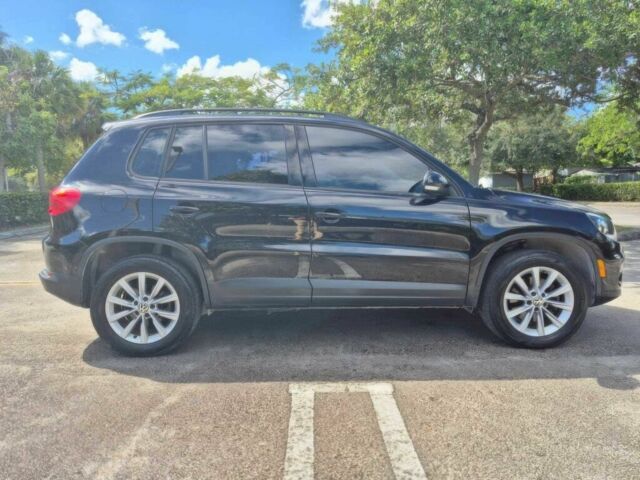 Черный Фольксваген Тигуан, объемом двигателя 2 л и пробегом 55 тыс. км за 17000 $, фото 2 на Automoto.ua