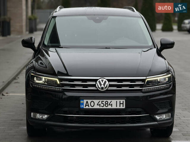 Черный Фольксваген Тигуан, объемом двигателя 2 л и пробегом 209 тыс. км за 23800 $, фото 3 на Automoto.ua